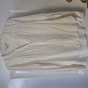 Women's blouse with eyelet pattern, size S.